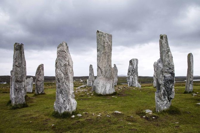 6-Day Outer Hebrides and Isle of Skye Small-Group Tour from Edinburgh - Day 6: Eilean Donan Castle photo stop, Ben Nevis under cloud, then Glencoe back to Edinburgh