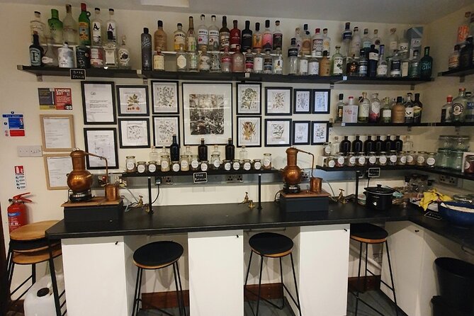 Distill a bottle of Gin on mini copper stills - While your gin distills, you get a cocktail break