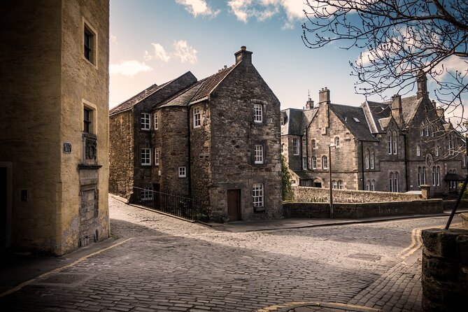 Edinburgh: Old Town's Highlights Walking Tour - Grassmarket: pubs, squares, and the darker past underfoot