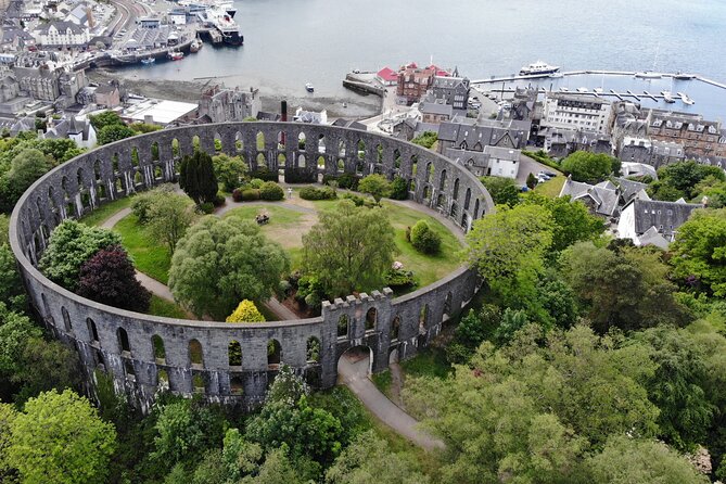 Glasgow: Glencoe & Oban Privately Guided Day Tour in Luxury MPV - Stop Six: Luss Lochside Village, Ben Lomond Framing, and Pier Pictures