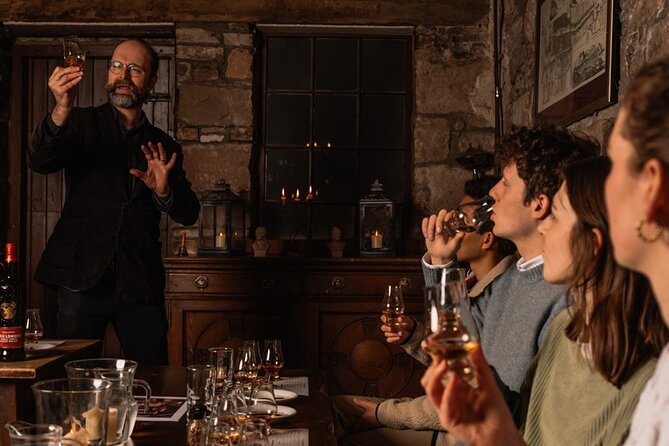 Small Group Edinburgh Whisky Tour and Tasting - Mercat Cross and the Royal Mile: the whisky story starts in the streets